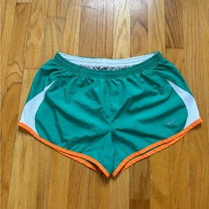 Nike Green Athletic Shorts with Orange Trim